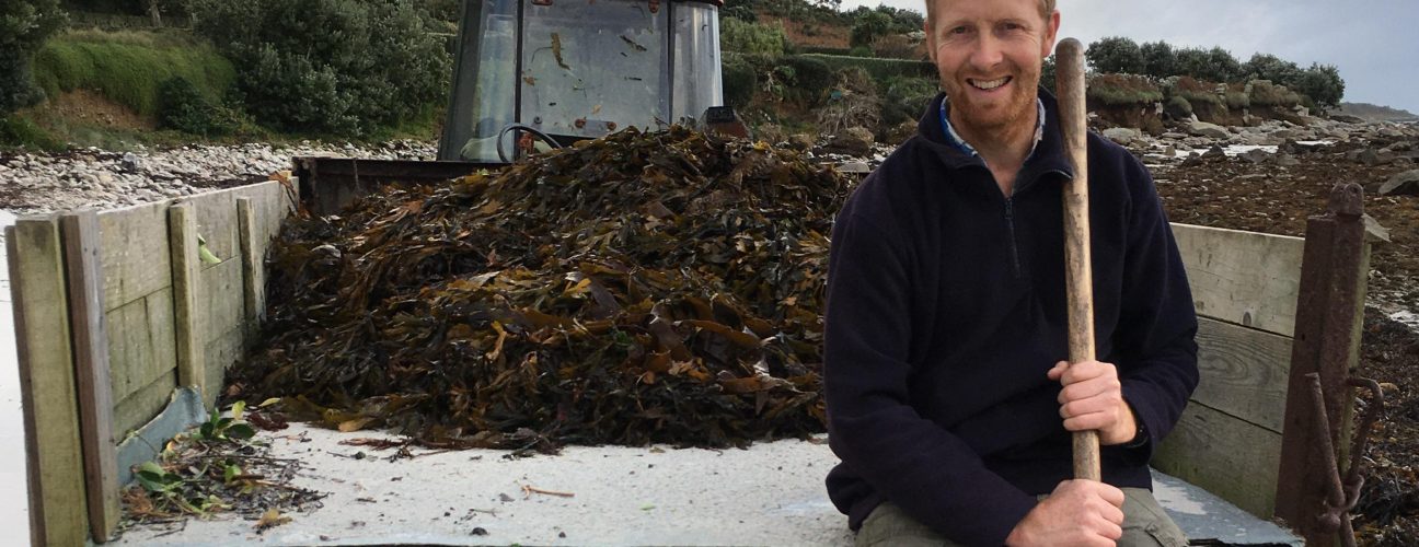 Jonathan Smith harvesting seaweed to build soil organic matter