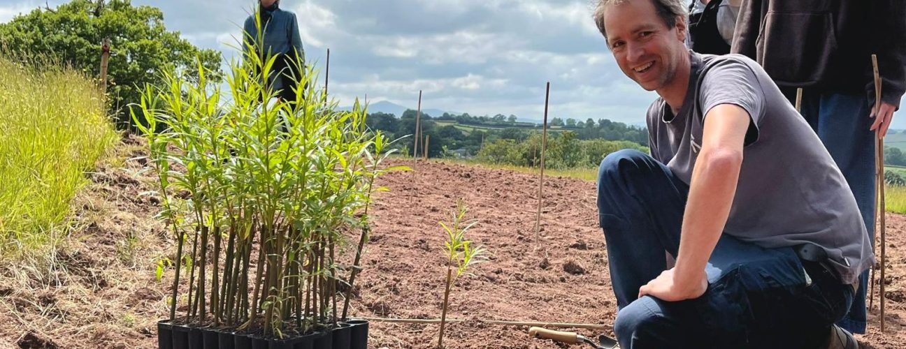 Rashid Benoy and students planting a new bioservice area at Black Mountains College