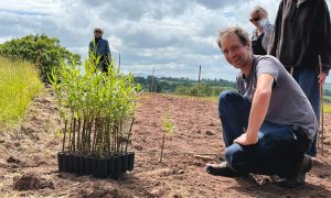 Rashid Benoy and students planting a new bioservice area at Black Mountains College