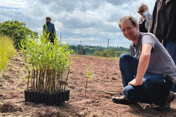 Rashid Benoy and students planting a new bioservice area at Black Mountains College