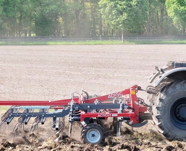 Photo of the Acticut machine in action